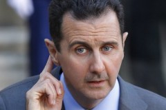 641686_syria-s-president-bashar-al-assad-answers-journalists-after-a-meeting-at-the-elysee-palace-in-paris.jpg